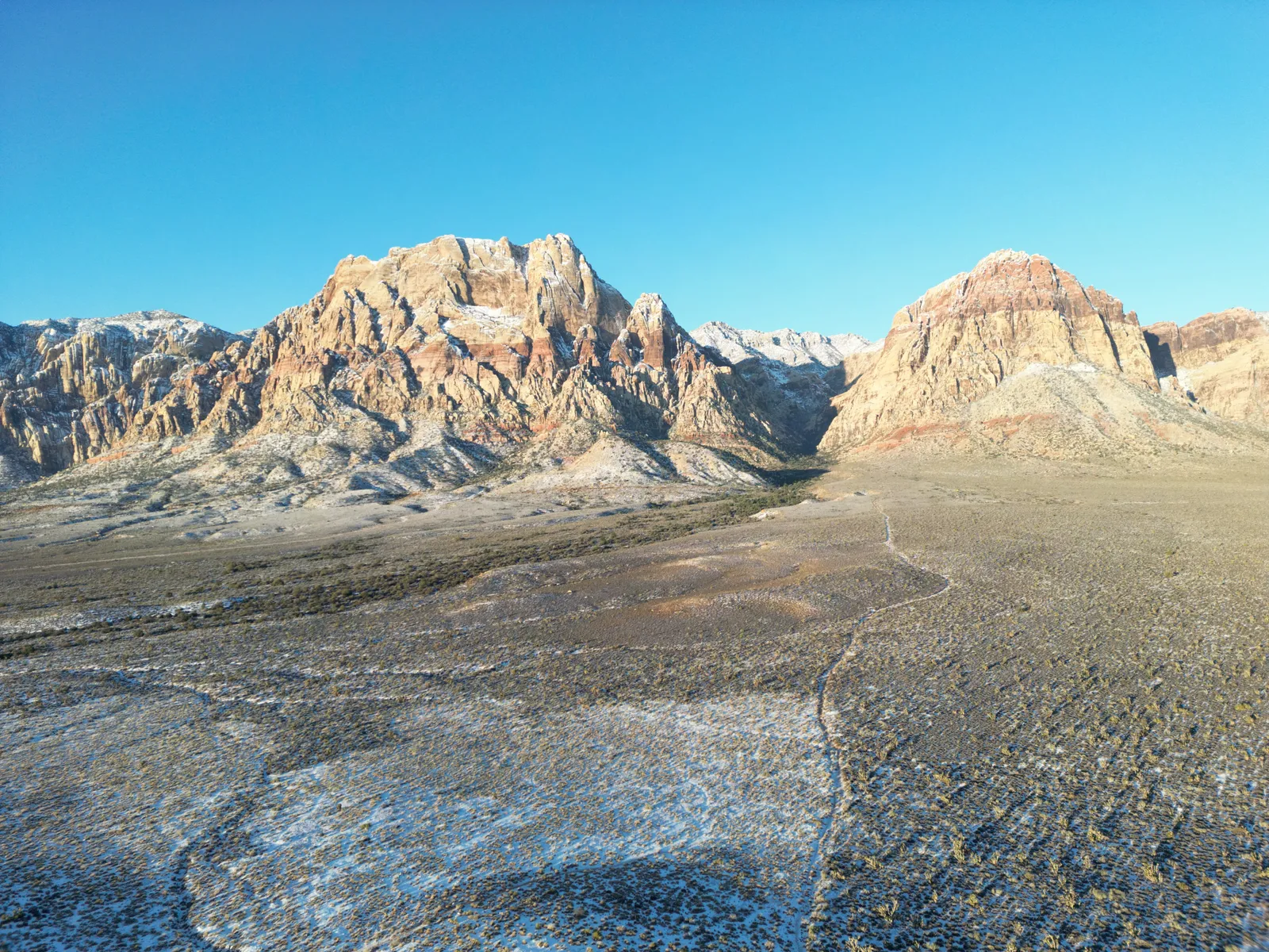 Red Rock Canyon with a rare dusting of snow aerial drone view