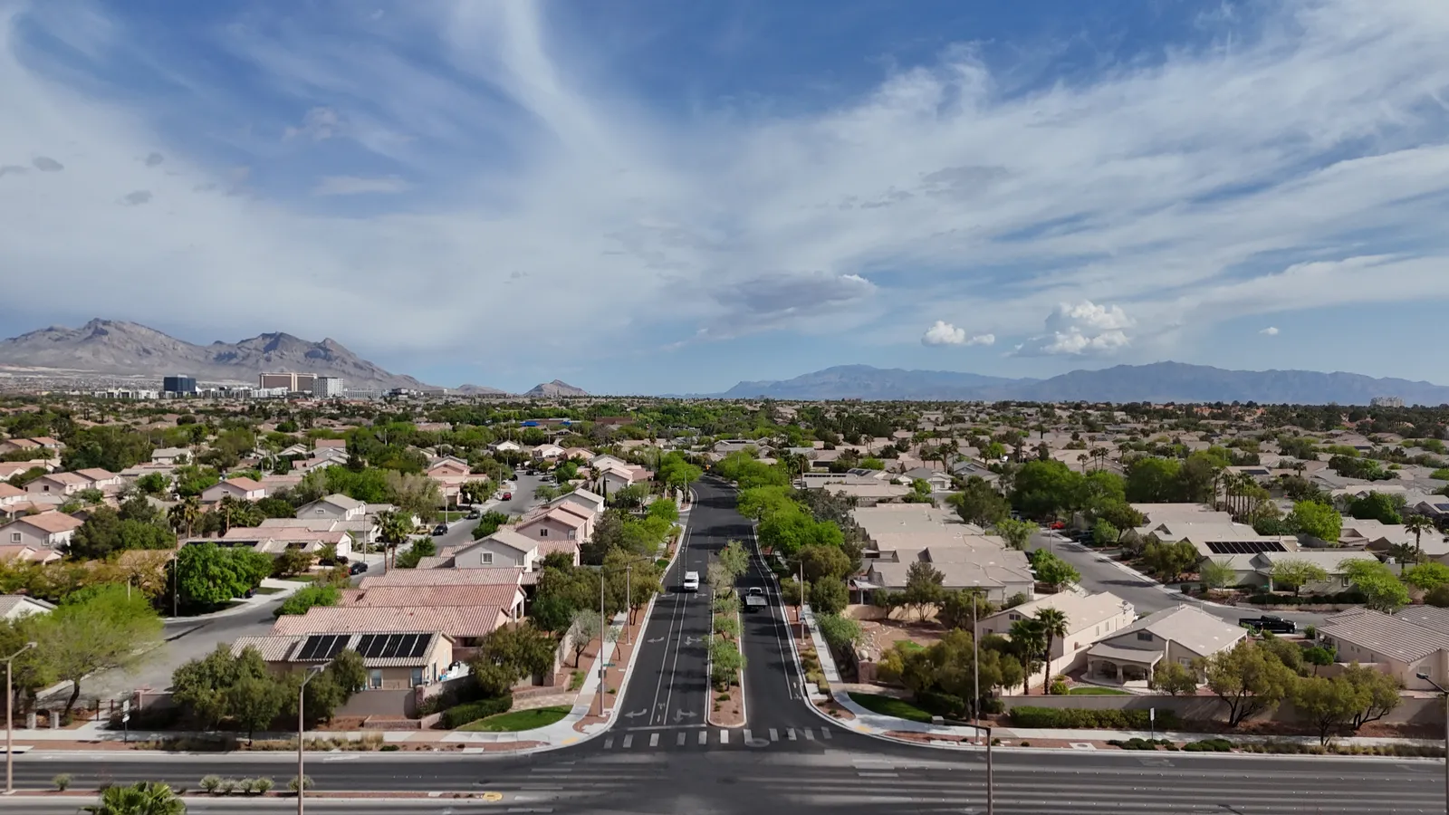 Aerial drone view of The Willows neighborhood in Summerlin with tree-lined streets